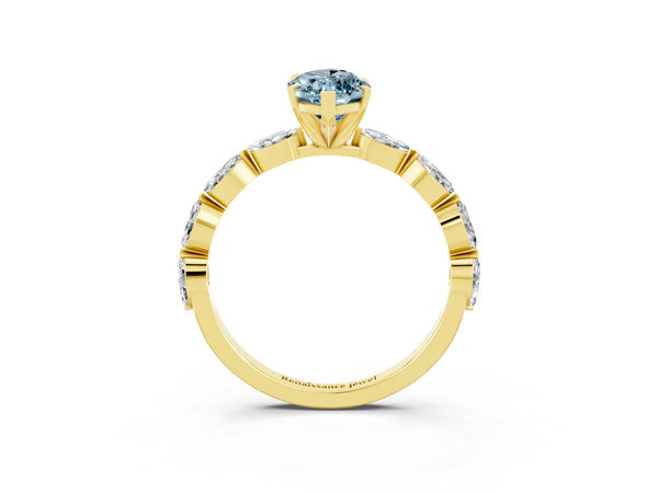 Yellow gold Marquise Cut Aquamarine Ring with Marquise Side Stones and Prong Setting