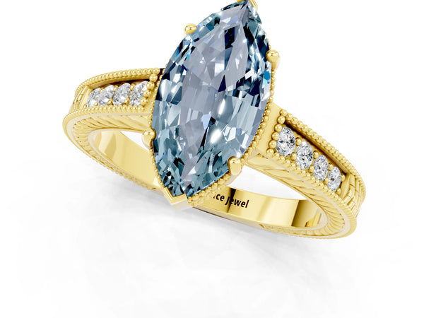 Yellow gold Marquise Cut Aquamarine Ring with Milgrain Pavé Band and Four-Prong Setting