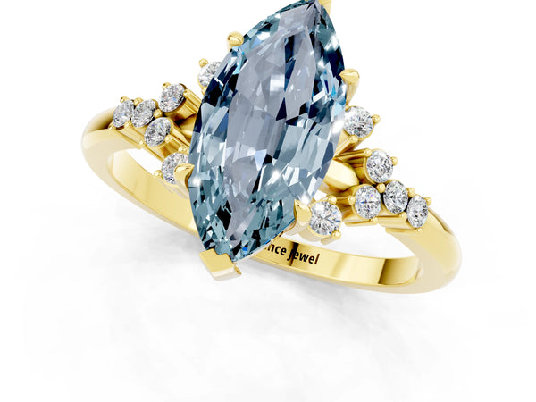 Yellow gold Marquise Cut Aquamarine Ring with Side Stones and Four-Prong Setting