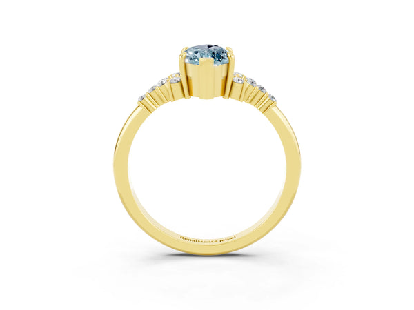 Yellow gold Marquise Cut Aquamarine Ring with Side Stones and Four-Prong Setting