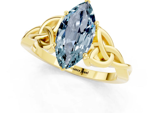 Yellow gold Marquise Cut Aquamarine Solitaire Engagement Ring with Celtic Knot Band and Four-Prong Setting_1