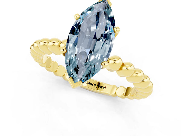 Yellow gold Marquise Cut Aquamarine Solitaire Ring with Beaded Band and Prong Setting