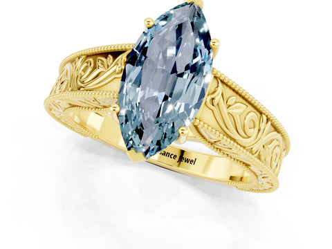 Yellow gold Marquise Cut Aquamarine Solitaire Ring with Engraved Band and Four-Prong Setting_1