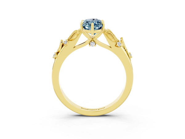 Yellow gold Marquise Cut Aquamarine Solitaire Ring with Leaf Motif Band and Four-Prong Setting