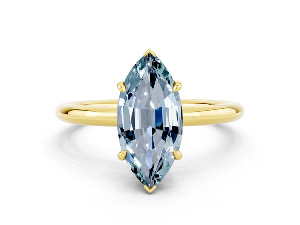 Yellow gold Marquise Cut Aquamarine Solitaire Ring with Thin Band and Four-Prong Setting