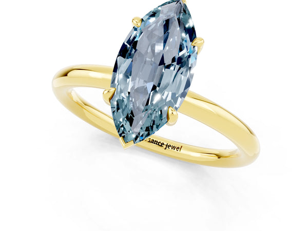 Yellow gold Marquise Cut Aquamarine Solitaire Ring with Thin Band and Four-Prong Setting