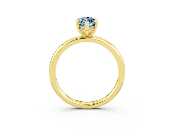 Yellow gold Marquise Cut Aquamarine Solitaire Ring with Thin Band and Four-Prong Setting