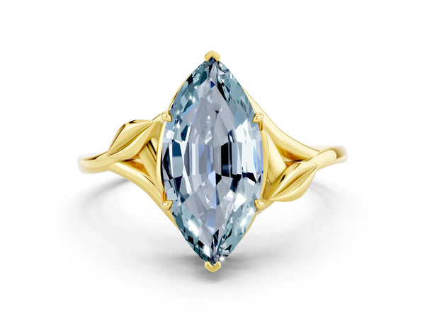 Yellow gold Marquise Cut Aquamarine Solitaire Ring with Twist Band and Four-Prong Setting