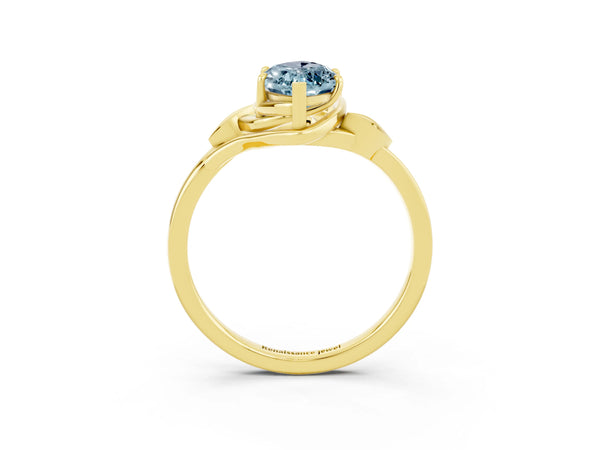Yellow gold Marquise Cut Aquamarine Solitaire Ring with Twist Band and Four-Prong Setting