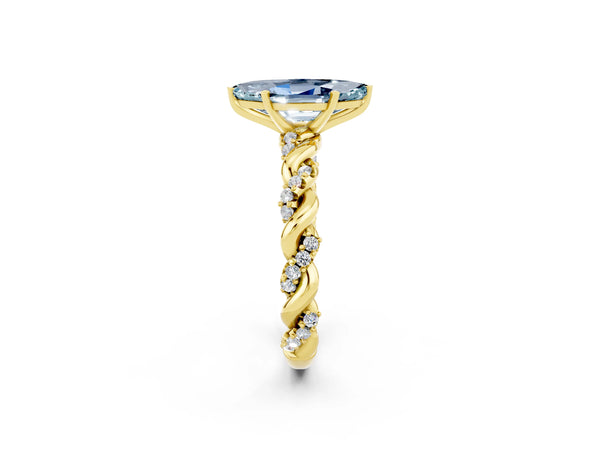 Yellow gold Marquise Cut Aquamarine Solitaire Ring with Twisted Band and Pavé Accents