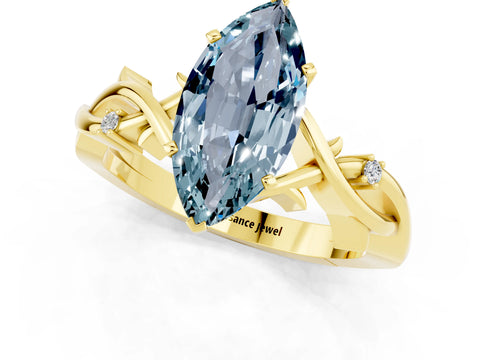 Yellow gold Marquise Cut Aquamarine Solitaire Ring with Twisted Band and Prong Setting_1