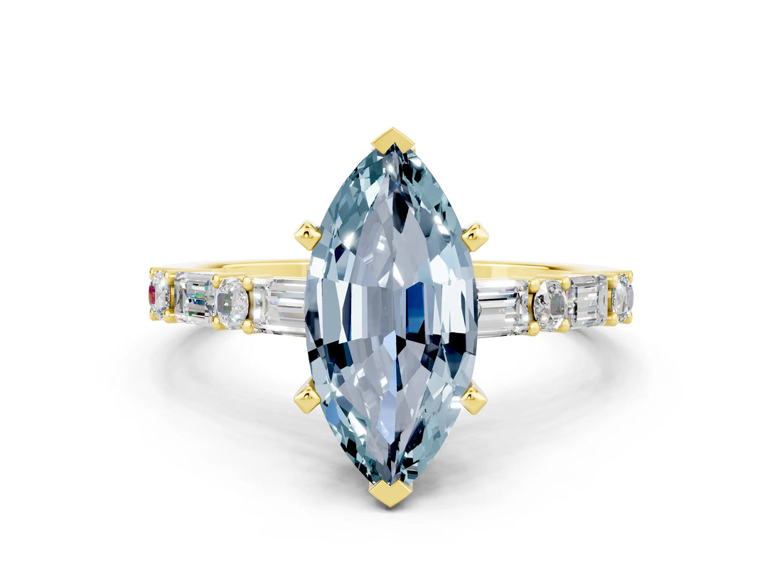 Yellow gold Marquise Cut Aquamarine Solitaire with Side Baguettes and Channel Set Band