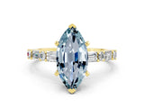 Yellow gold Marquise Cut Aquamarine Solitaire with Side Baguettes and Channel Set Band
