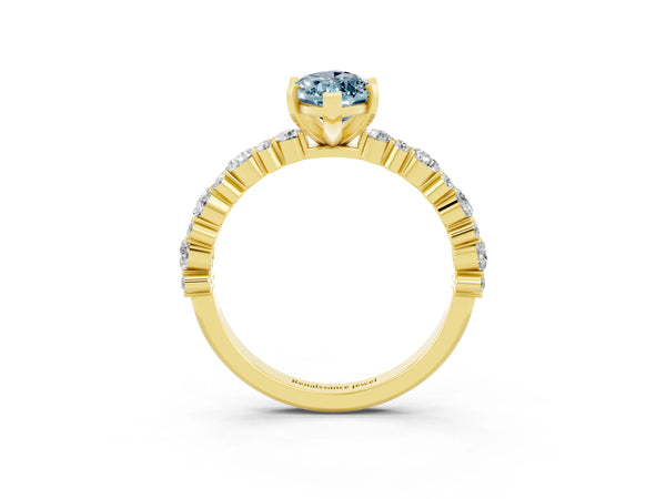Yellow gold Marquise Cut Aquamarine Side Stone Solitaire Ring with Round  and Four-Prong Setting