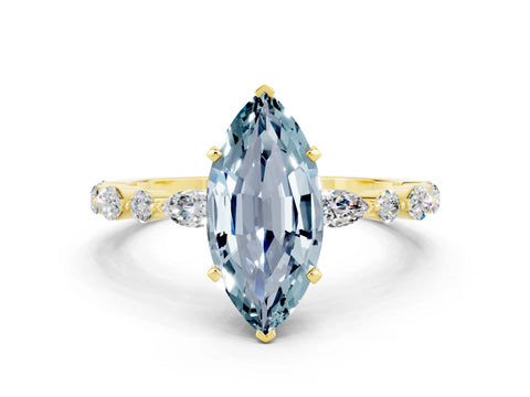 Yellow gold Marquise Cut Aquamarine Solitaire with Side Stones on a Pavé Band and Four-Prong Setting