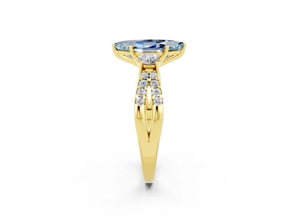 Yellow gold Marquise Cut Aquamarine Three-Stone Ring with Pavé Split Shank and Four-Prong Setting