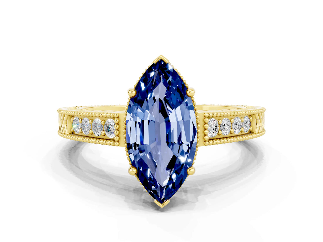 Yellow gold Marquise Cut Blue Sapphire Engagement Ring with Milgrain Channel Set Band and Prong Setting