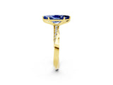 Yellow gold Marquise Cut Blue Sapphire Engagement Ring with Side Stone Accents and Four-Prong Setting_62