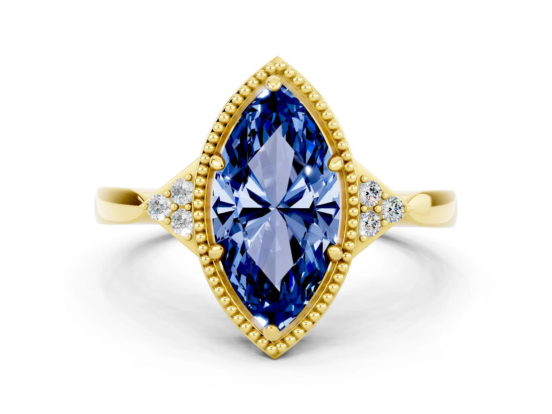 Yellow gold Marquise Cut Blue Sapphire Halo Ring with Tapered Band and Four-Prong Setting