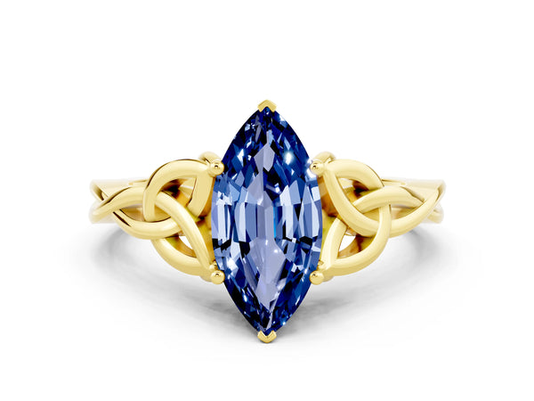 Yellow gold Marquise Cut Blue Sapphire Solitaire Celtic Knot Ring with Four-Prong Setting