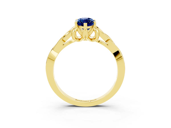 Yellow gold Marquise Cut Blue Sapphire Solitaire Celtic Knot Ring with Four-Prong Setting