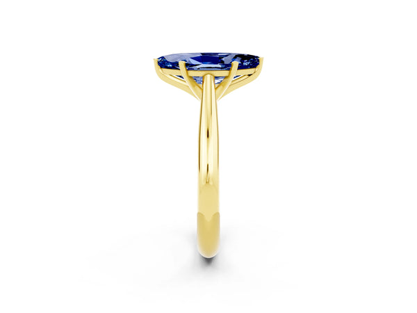 Yellow gold Marquise Cut Blue Sapphire Solitaire Engagement Ring with Cathedral Setting and Four-Prong Mount