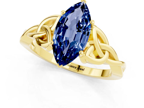Yellow gold Marquise Cut Blue Sapphire Solitaire Engagement Ring with Celtic Knot Band and Four-Prong Setting_1