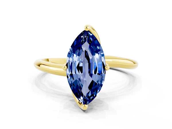 Yellow gold Marquise Cut Blue Sapphire Solitaire Engagement Ring with Four-Prong Setting and Classic Band