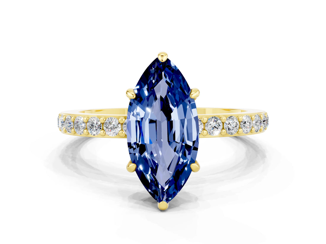 Yellow gold Marquise Cut Blue Sapphire Solitaire Engagement Ring with Pavé Band and Four-Prong Setting
