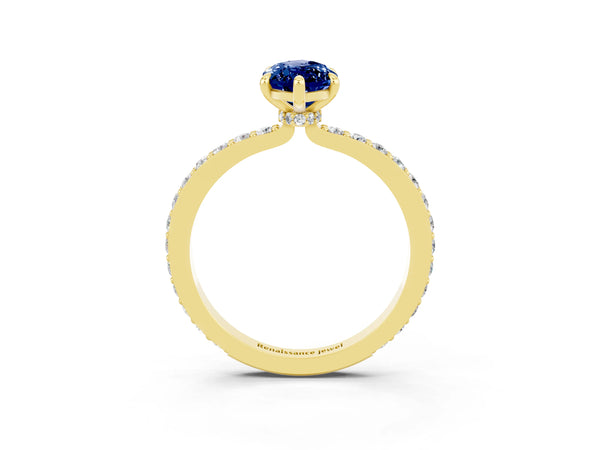Yellow gold Marquise Cut Blue Sapphire Solitaire Engagement Ring with Pavé Band and Four-Prong Setting