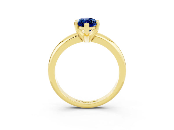 Yellow gold Marquise Cut Blue Sapphire Solitaire Engagement Ring with Round Band and Four-Prong Setting