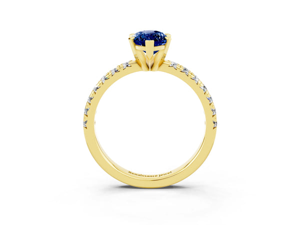 Yellow gold Marquise Cut Blue Sapphire Solitaire Pavé Engagement Ring with Round Band and Prong Setting