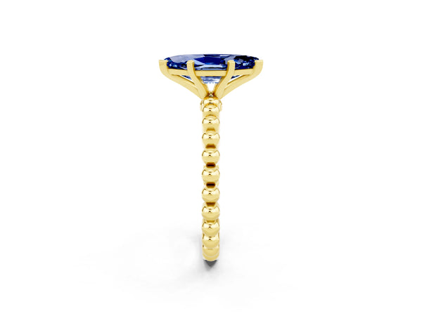 Yellow gold Marquise Cut Blue Sapphire Solitaire Ring with Beaded Band and Prong Setting