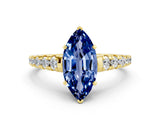 Yellow gold Marquise Cut Blue Sapphire Solitaire Ring with Cathedral Setting and Pavé Band