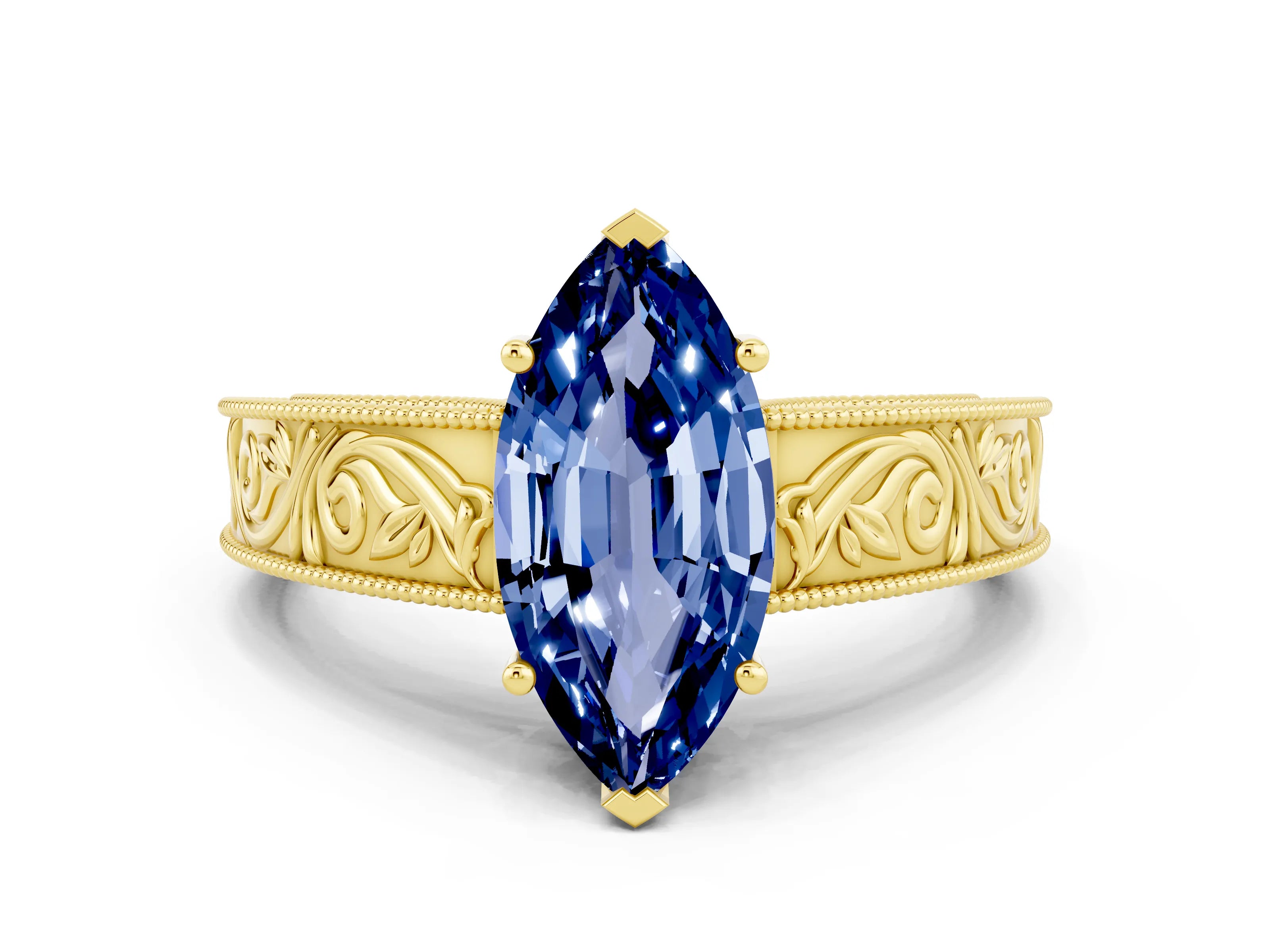 Yellow gold Marquise Cut Blue Sapphire Solitaire Ring with Engraved Band and Four-Prong Setting