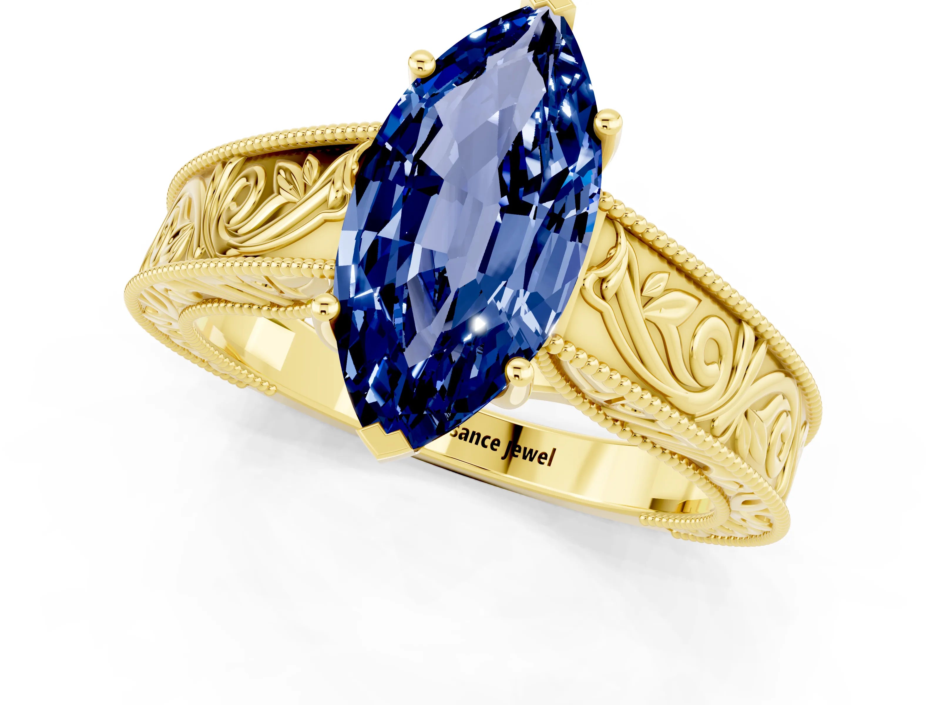 Yellow gold Marquise Cut Blue Sapphire Solitaire Ring with Engraved Band and Four-Prong Setting_1