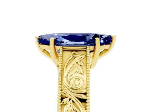 Yellow gold Marquise Cut Blue Sapphire Solitaire Ring with Engraved Band and Four-Prong Setting_5