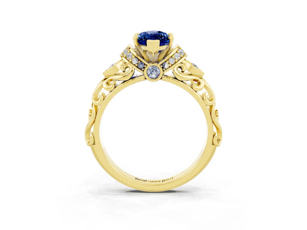 Yellow gold Marquise Cut Blue Sapphire Solitaire Ring with Filigree Band and Four-Prong Setting