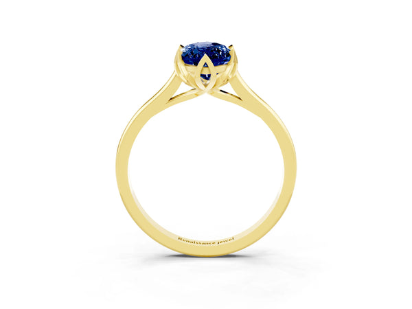 Yellow gold Marquise Cut Blue Sapphire Solitaire Ring with Flower Prong Setting and Classic Band