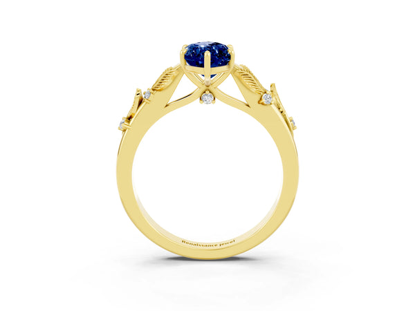 Yellow gold Marquise Cut Blue Sapphire Solitaire Ring with Leaf Motif Band and Four-Prong Setting