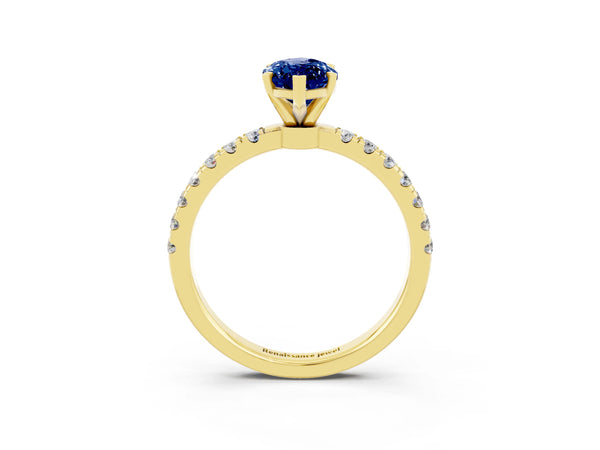 Yellow gold Marquise Cut Blue Sapphire Solitaire Ring with Pavé Accents and Four-Prong Setting