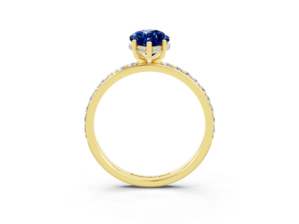 Yellow gold Marquise Cut Blue Sapphire Solitaire Ring with Pavé Band and Hidden Halo