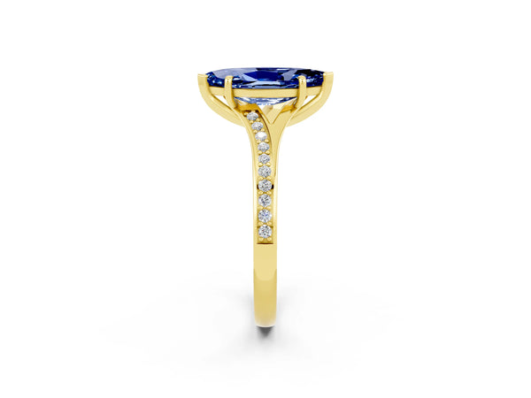 Yellow gold Marquise Cut Blue Sapphire Solitaire Ring with Pavé Band and Prong Setting