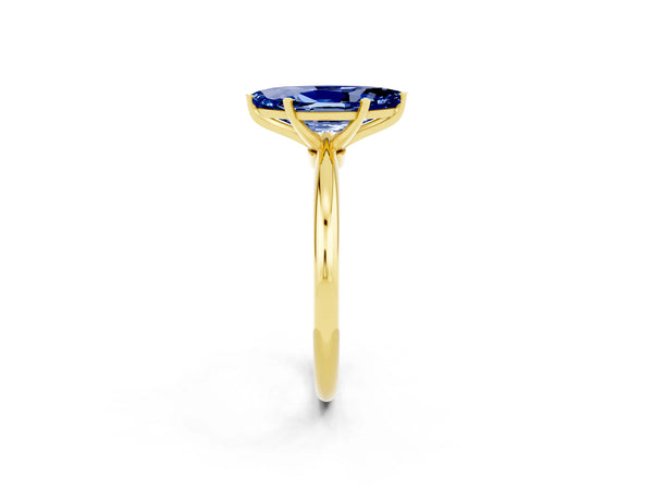 Yellow gold Marquise Cut Blue Sapphire Solitaire Ring with Six-Prong Setting and Classic Band