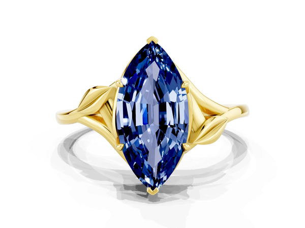 Yellow gold Marquise Cut Blue Sapphire Solitaire Ring with Twist Band and Four-Prong Setting