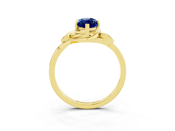 Yellow gold Marquise Cut Blue Sapphire Solitaire Ring with Twist Band and Four-Prong Setting