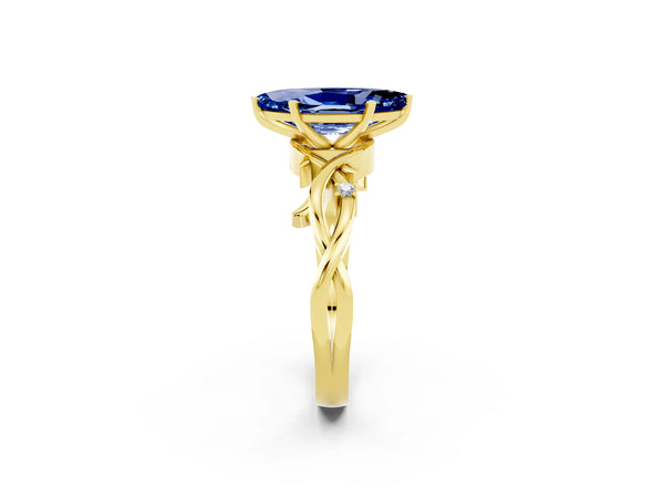 Yellow gold Marquise Cut Blue Sapphire Solitaire Ring with Twisted Band and Prong Setting