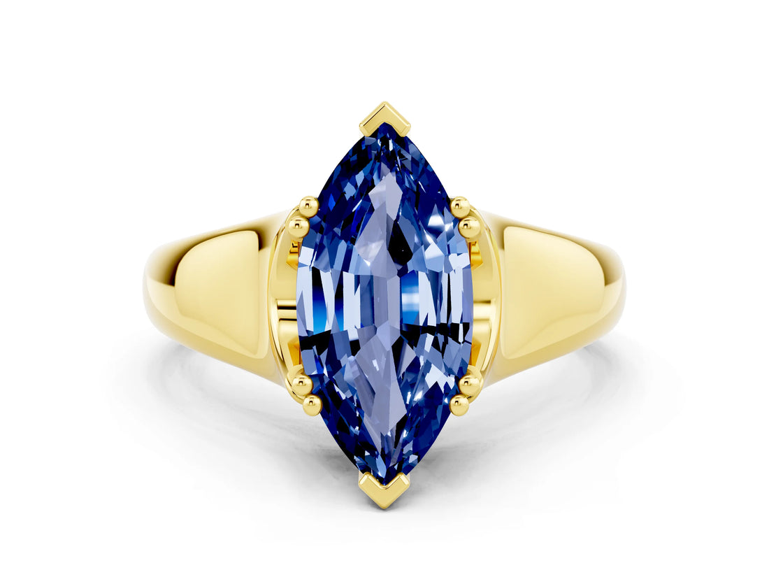 Yellow gold Marquise Cut Blue Sapphire Solitaire Ring with Wide Band and Prong Setting