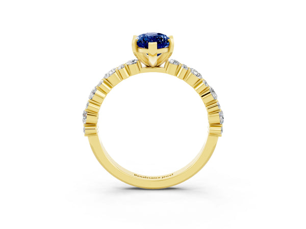 Yellow gold Marquise Cut Blue Sapphire Side Stone Solitaire Ring with Round  and Four-Prong Setting