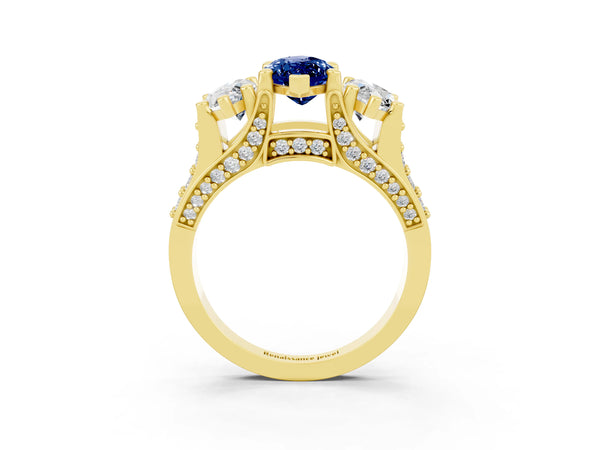 Yellow gold Marquise Cut Blue Sapphire Three-Stone Ring with Channel Set Band and Four-Prong Setting